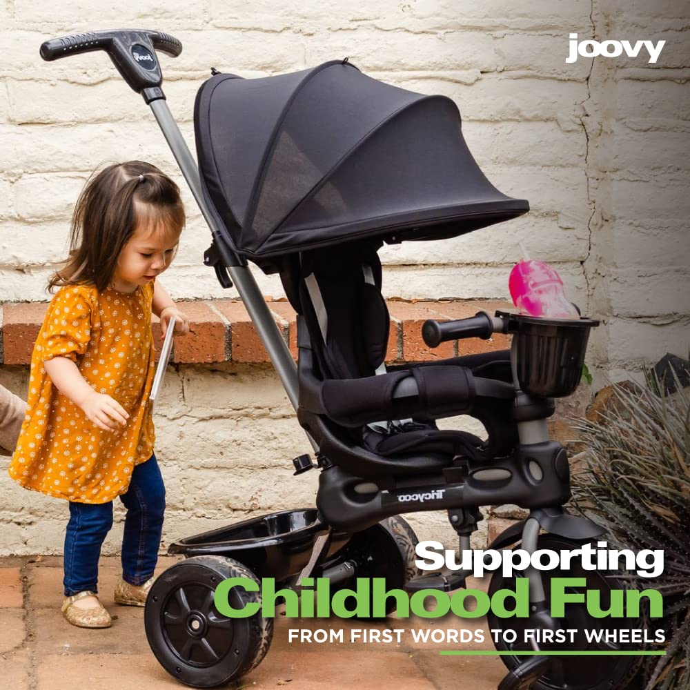 Joovy Tricycoo 4.1 Kids Tricycle with 4-Stages Featuring Extra-Wide Front Tire, Removable and Adjustable Parent Handle, Safety Harness, Machine-Washable Seat Pad, and Retractable Canopy (Black)