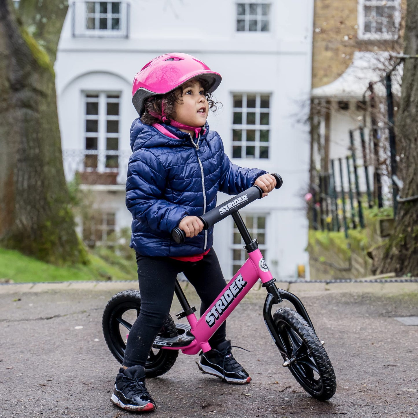 Strider 12” Sport Bike, Pink - No Pedal Balance Bicycle for Kids 1 to 4 Years - Includes Safety Pad, Padded Seat, Mini Grips & Flat-Free Tires - Tool-Free Assembly & Adjustments