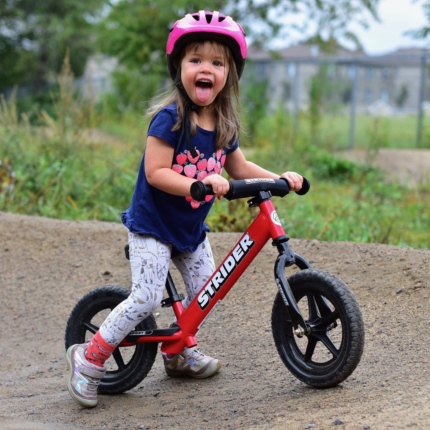 Strider 12” Sport Bike, Red - No Pedal Balance Bicycle for Kids 1 to 4 Years - Includes Safety Pad, Padded Seat, Mini Grips & Flat-Free Tires - Tool-Free Assembly & Adjustments